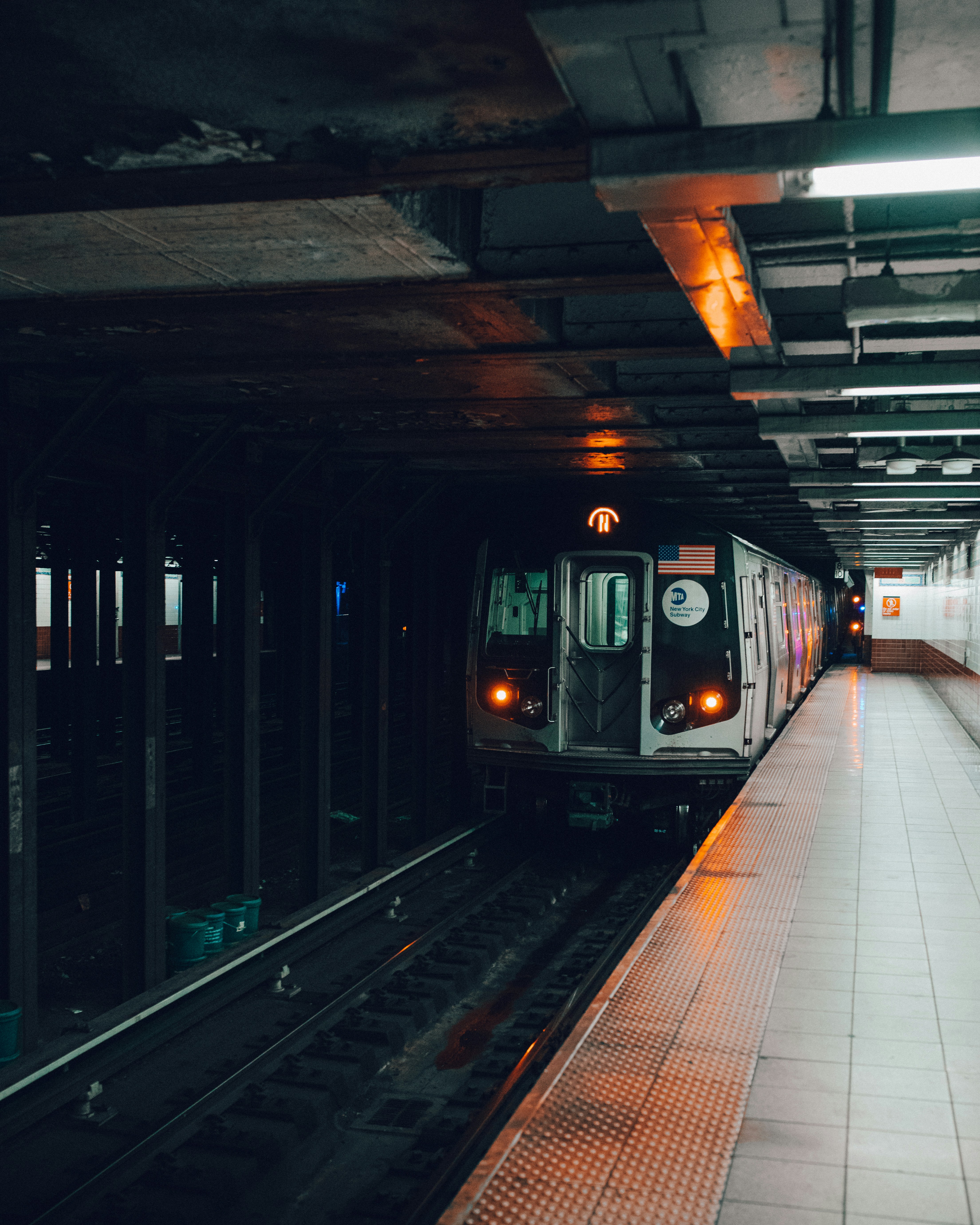 train in train station during daytime