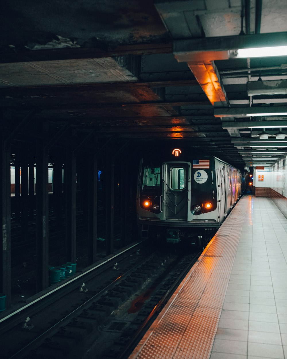 train in train station during daytime