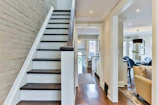 white wooden door near staircase