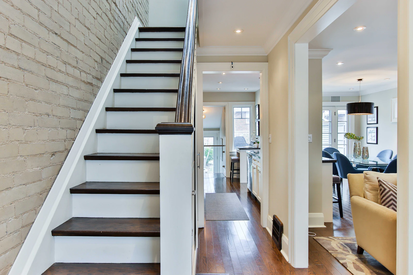 Staircase with white risers and dark treads in a home
