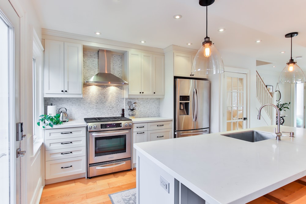 a kitchen with white counters.