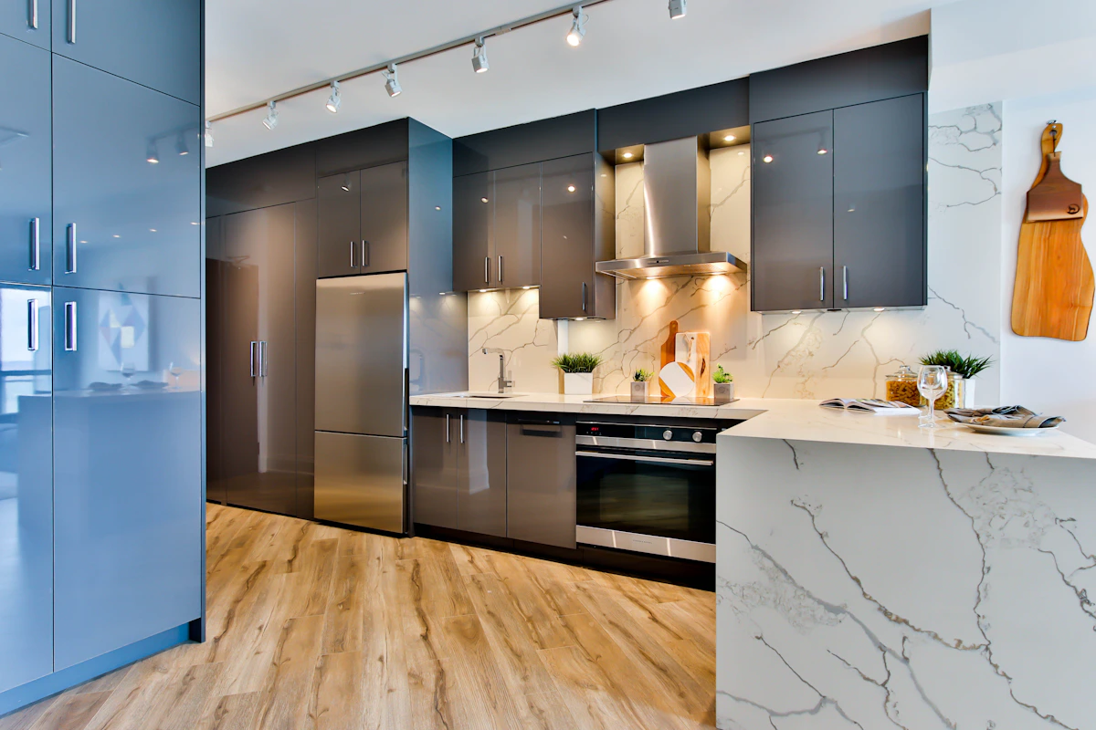Smart lighting installation Hamilton — app-controlled LED dimmers and custom scene presets in modern kitchen by Lunera