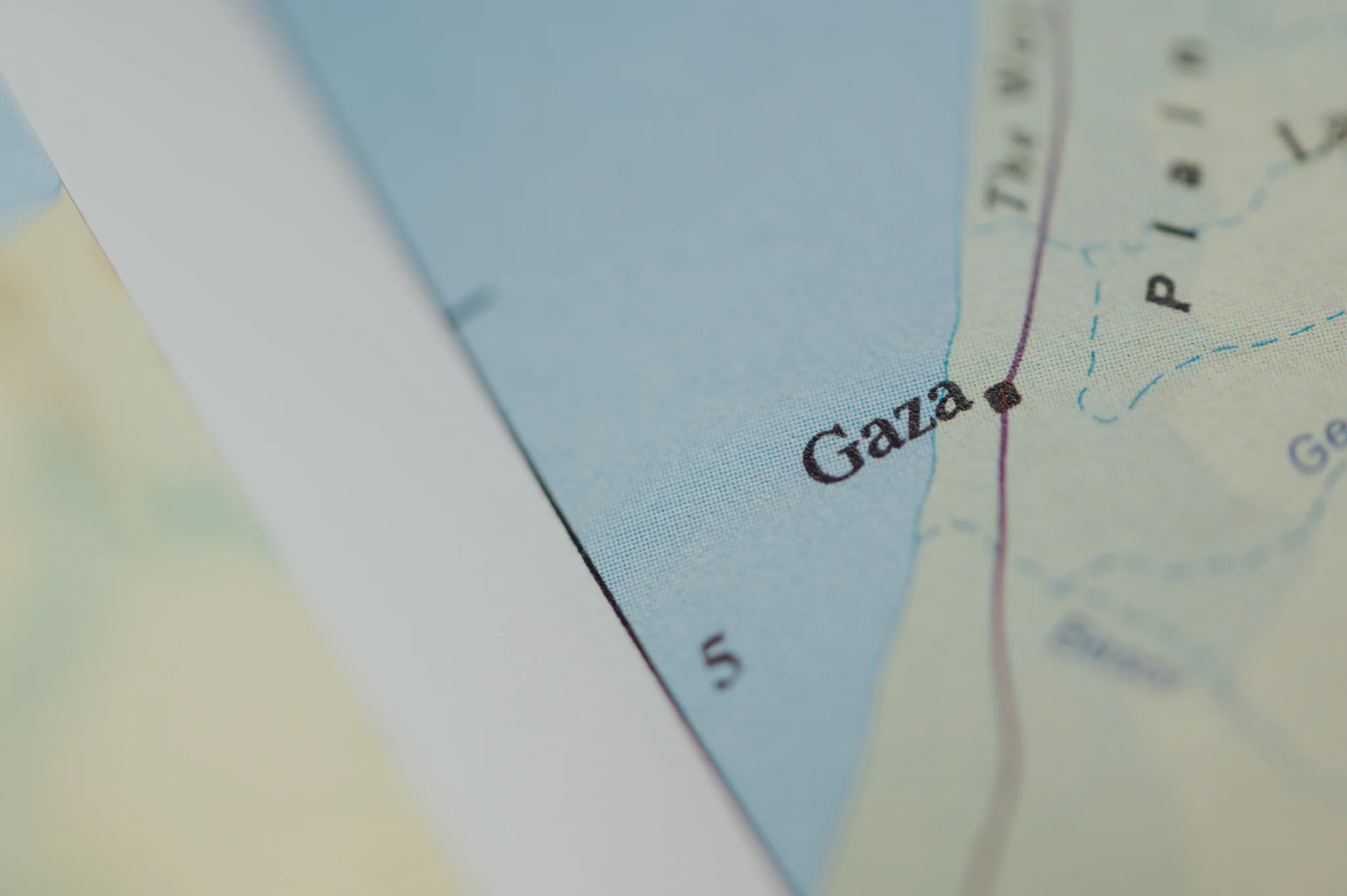 Close-up of a printed map showing the city of Gaza on the Mediterranean coast