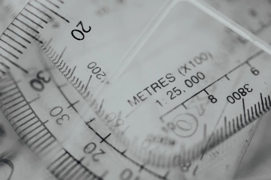 white and black analog gauge
