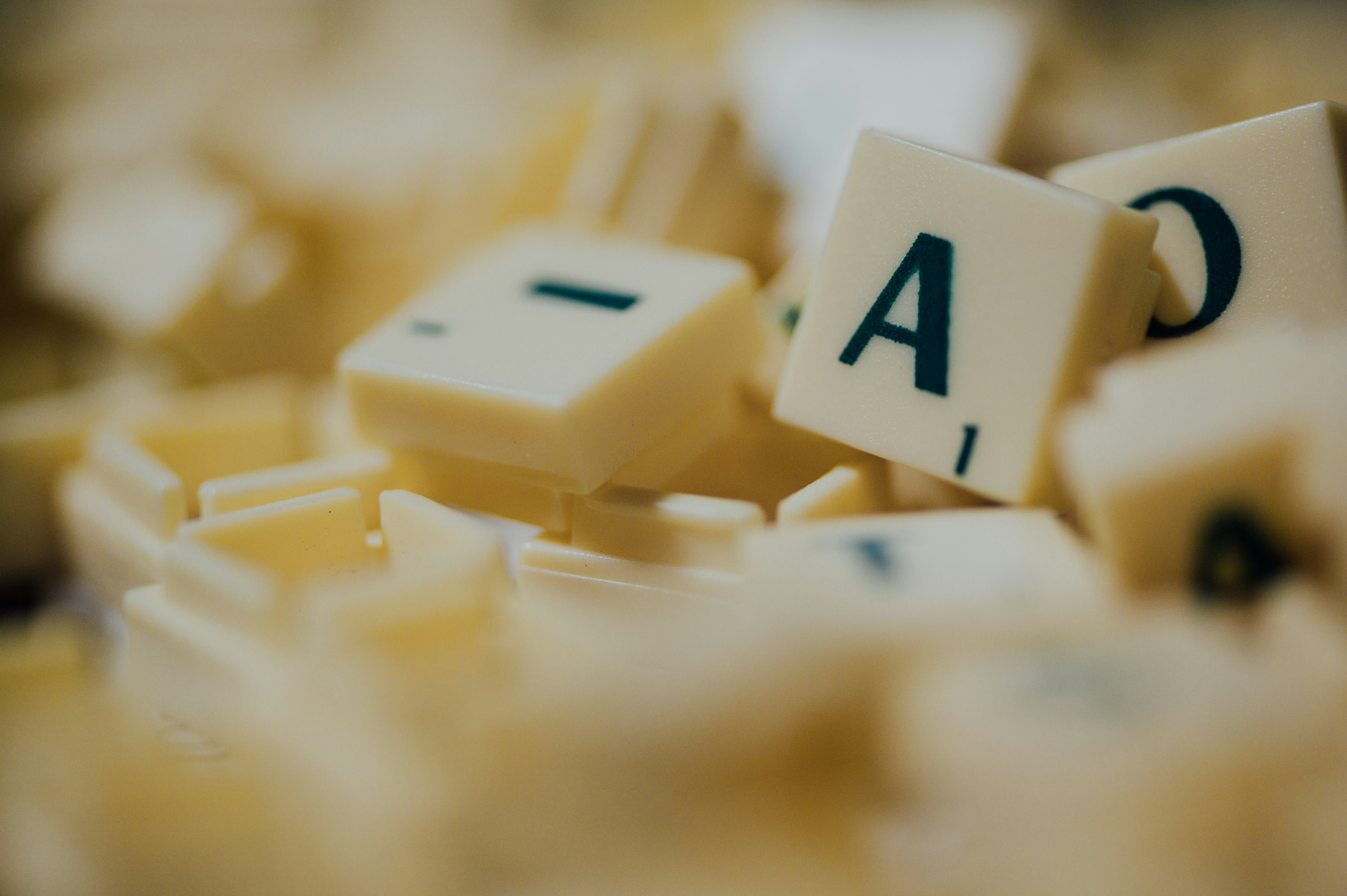 white and black dice on white and yellow food