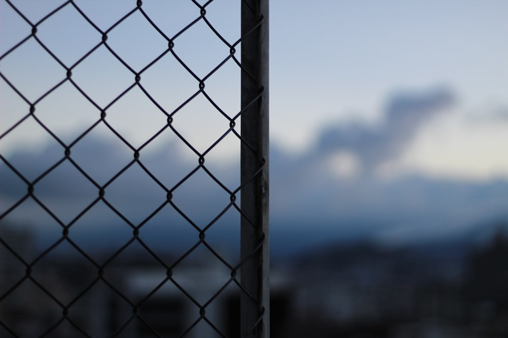 black metal fence during daytime