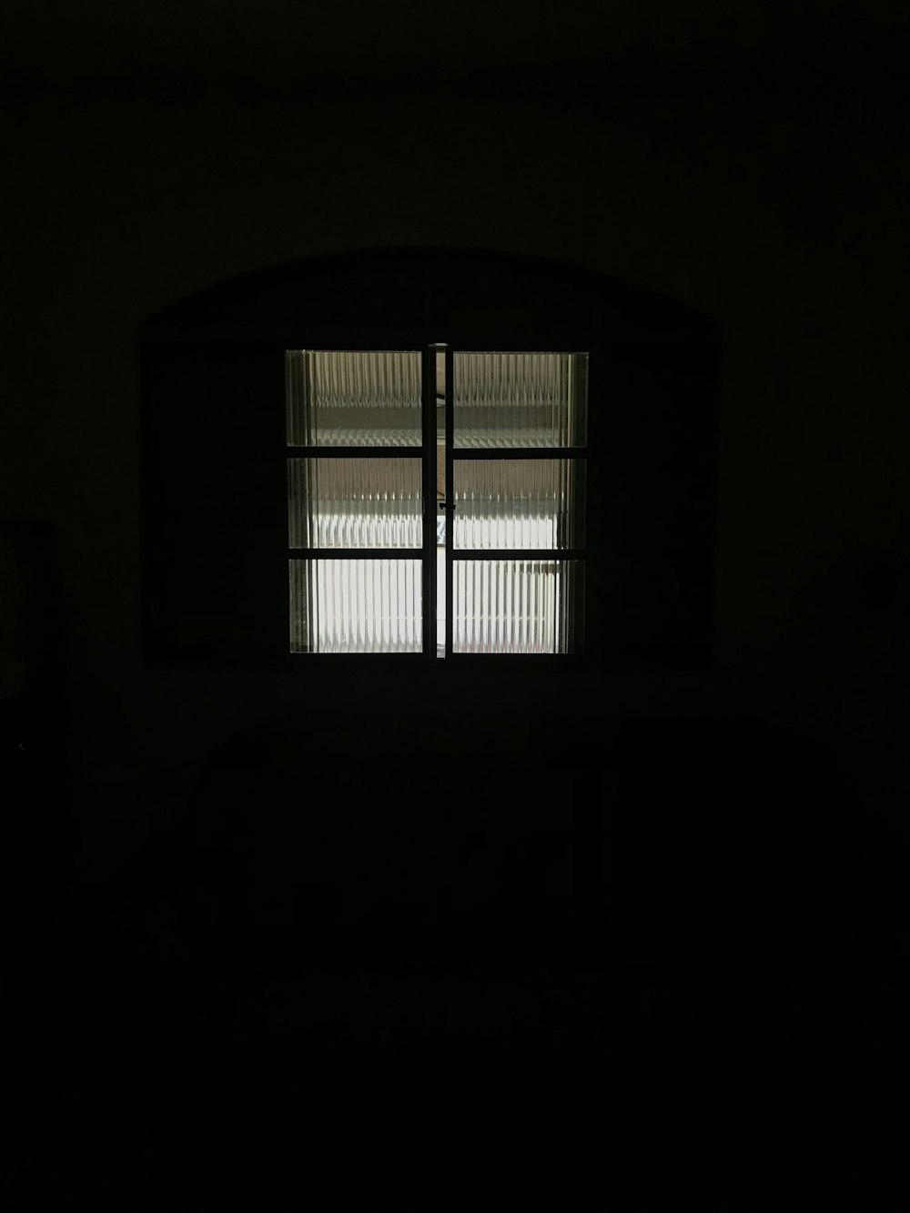 black framed glass window closed