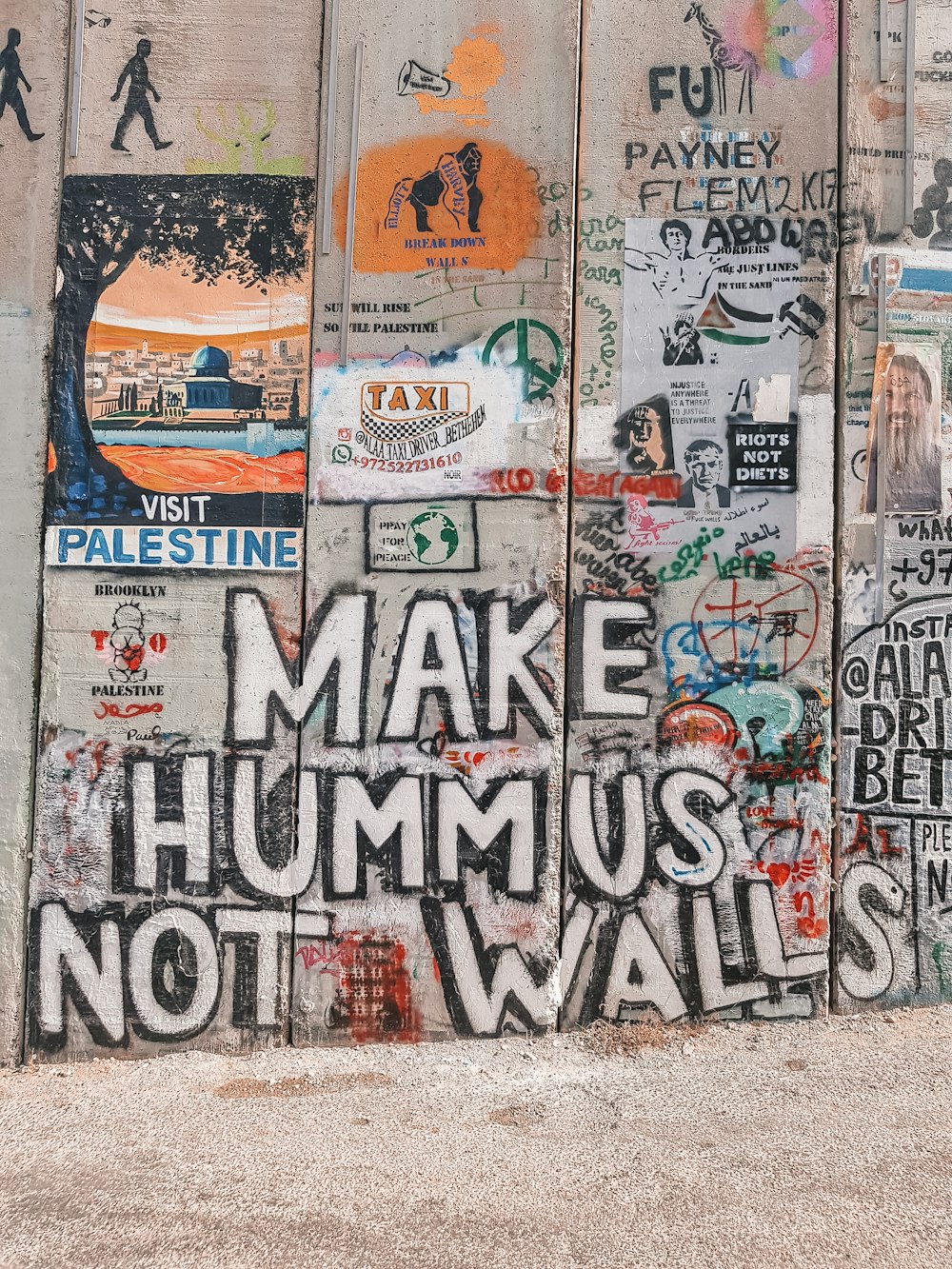 white and blue wall graffiti