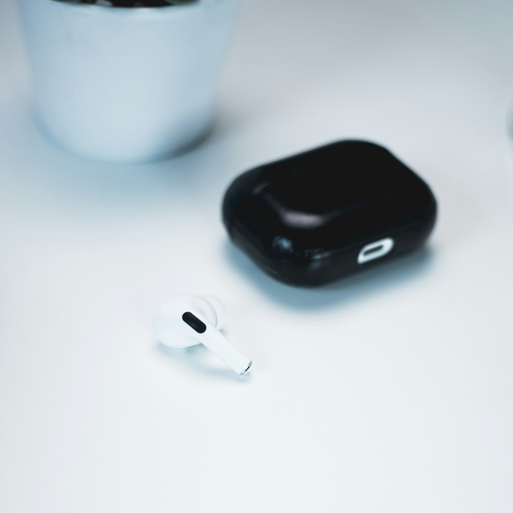 black and white apple airpods charging case