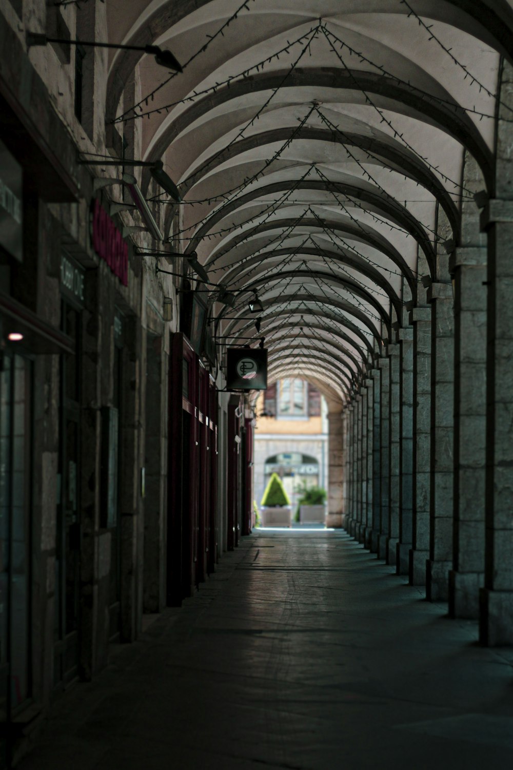 red and brown brick hallway