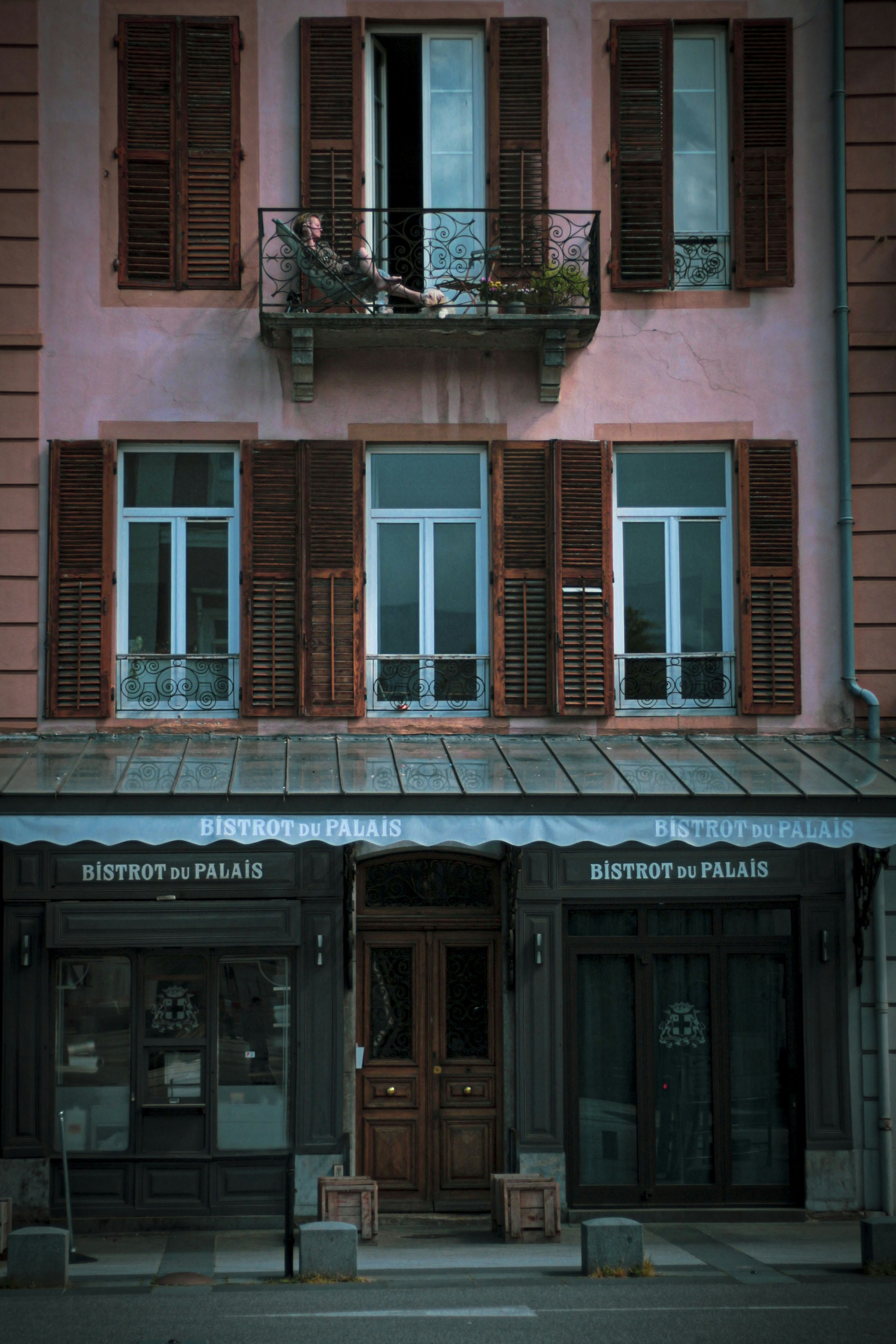 brown brick building with windows