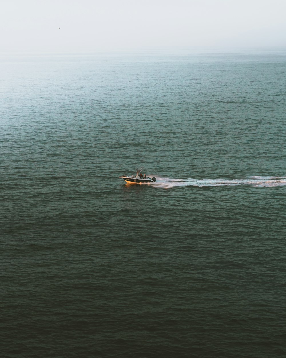 person surfing on sea during daytime