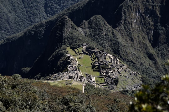 aerial view of city near mountain during daytime in Mountain Machu Picchu Peru