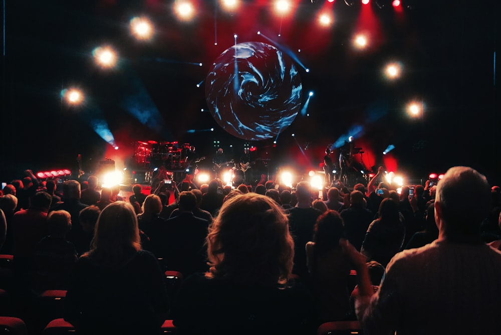 people watching concert during night time