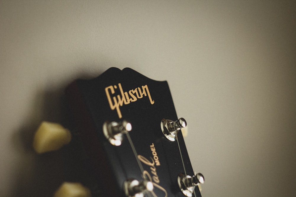 black and gold guitar pick