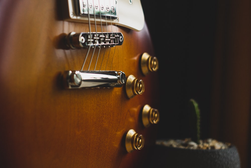 brown and white guitar head stock