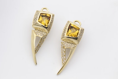 gold and silver stone studded ring