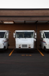white van on gray asphalt road during daytime