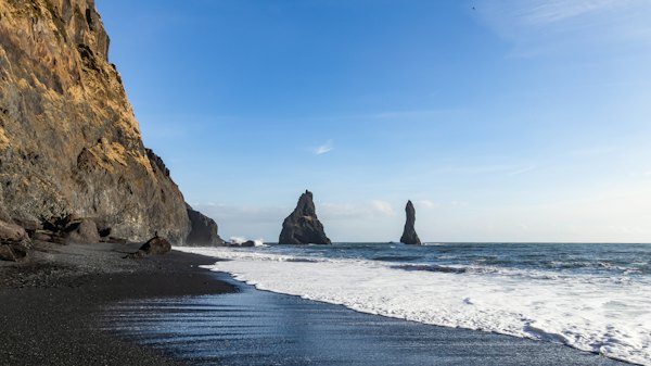 Reynisfjara’s black sand and the Reynisdrangar sea stacks — Vík í Mýrdal, Iceland