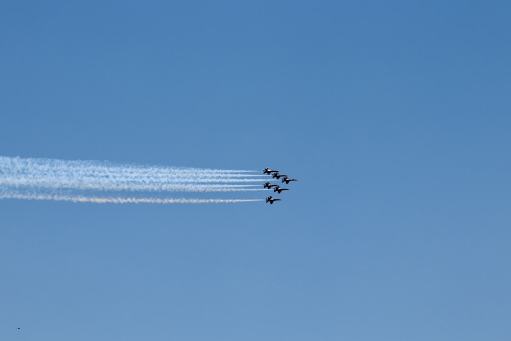 white jet plane in the sky