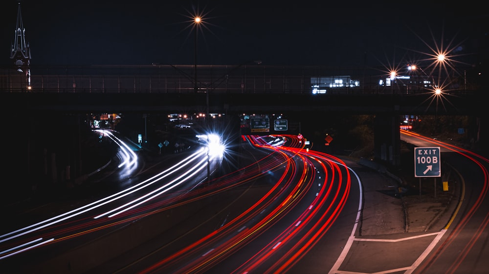 time lapse photography of cars on road during night time