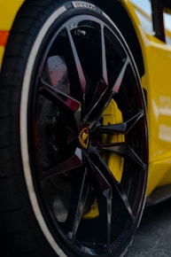 black and yellow wheel with tire