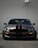 black bmw m 3 on road