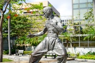 gray concrete statue of man