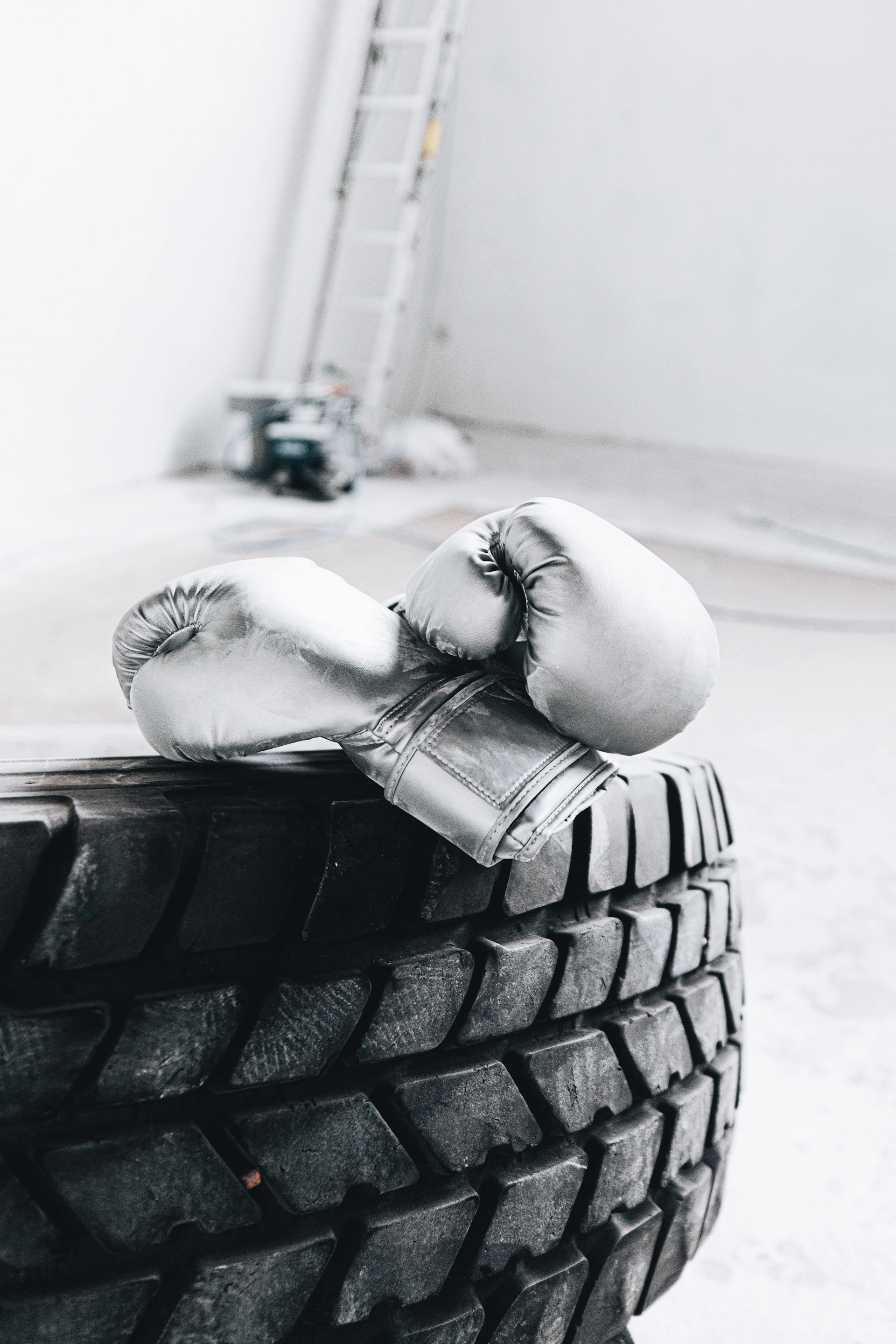 woman lying on black and white textile