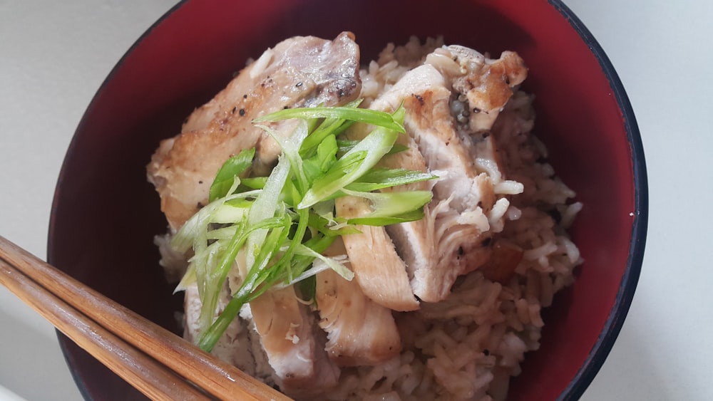 cooked food on red ceramic bowl