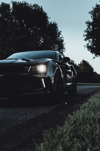 black bmw m 3 on road during night time