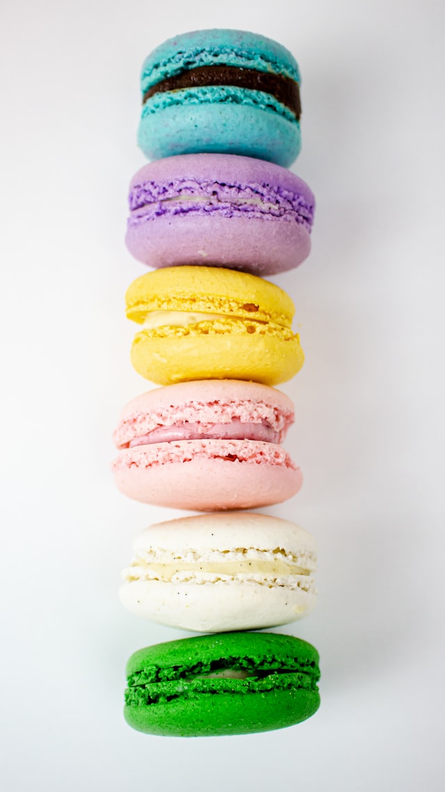 Colorful assorted macarons stacked in a box