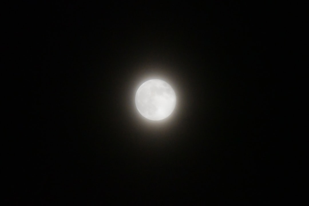 white moon in dark room