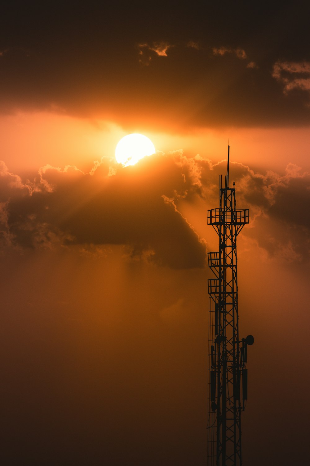 silhouette of tower during sunset