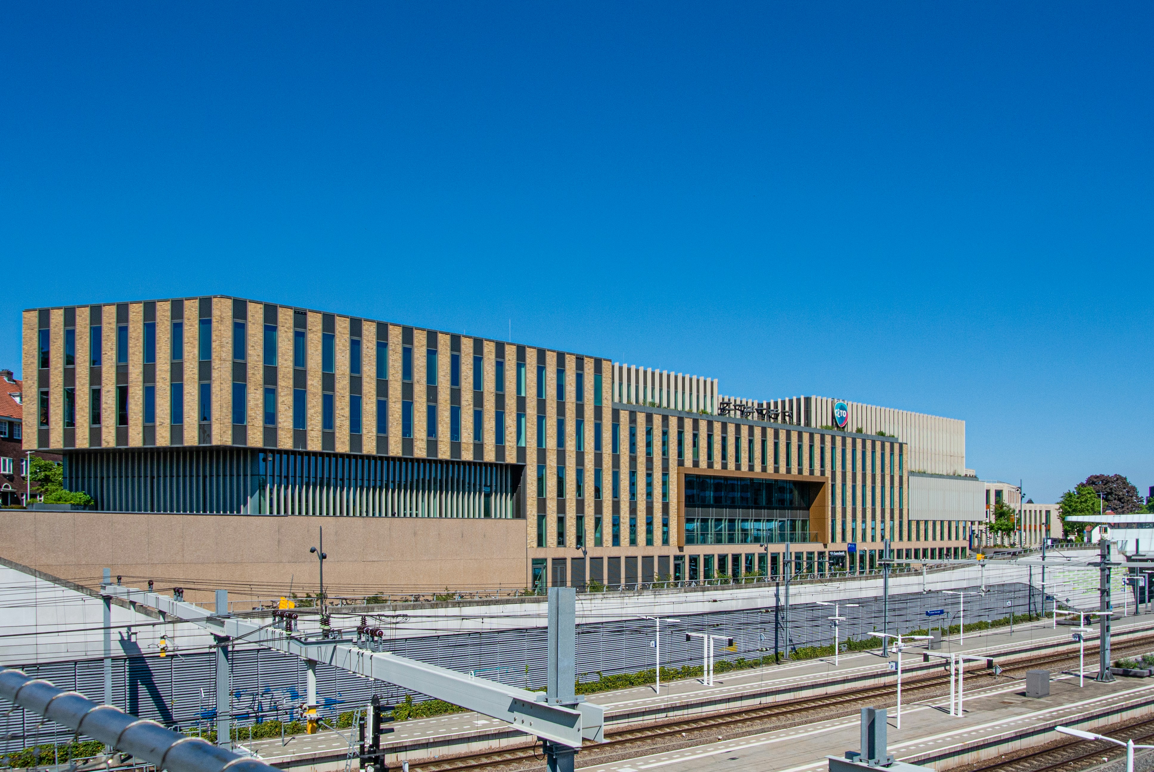 brown concrete building under blue sky during daytime