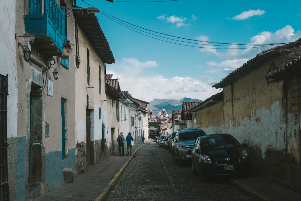 cars parked beside the road during daytime