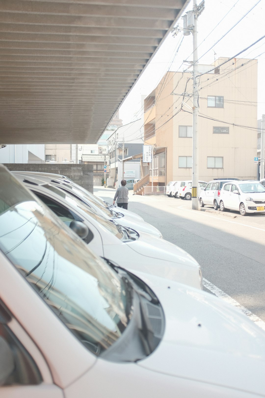 cars parked on side of the road during daytime