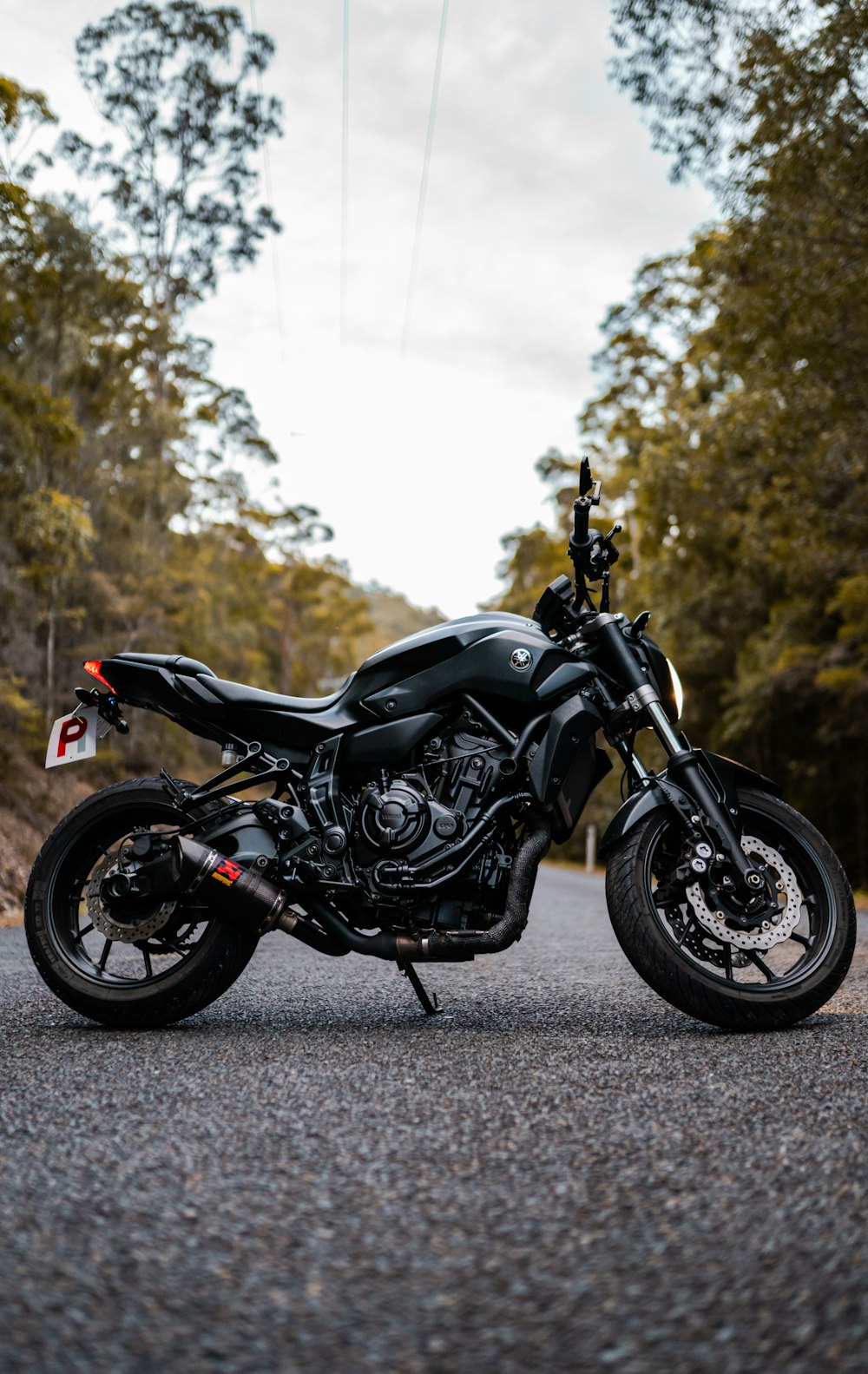 black and silver cruiser motorcycle on road during daytime