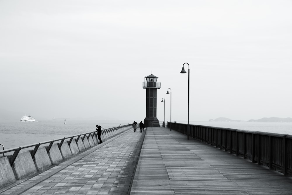 black and white light post on dock