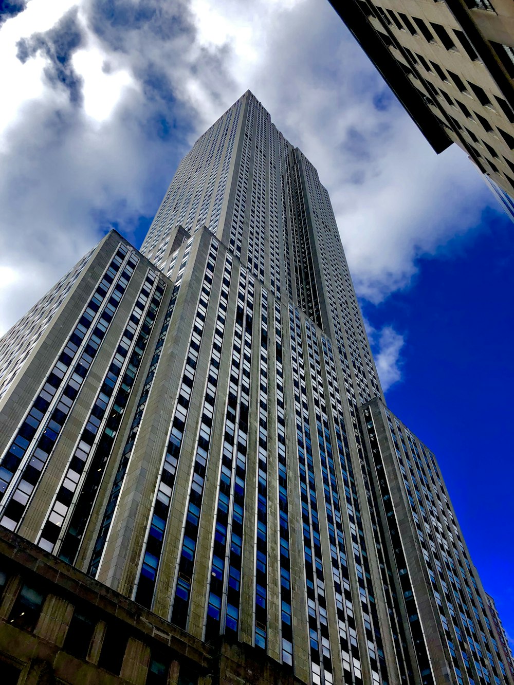 low angle photography of high rise building