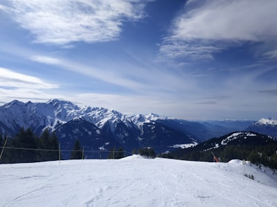 snow covered mountain under blue sky during daytime