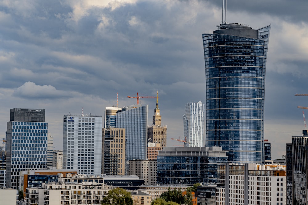 city skyline under blue sky during daytime