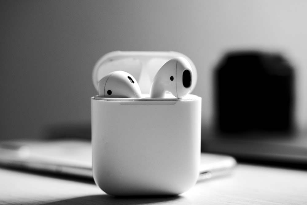 white apple airpods charging case