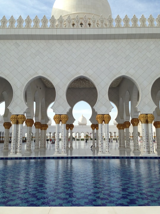 white and brown concrete building in Sheikh Zayed Grand Mosque Center United Arab Emirates