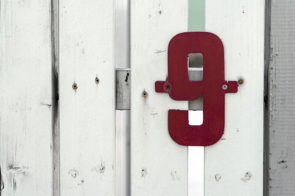 red and white wooden door