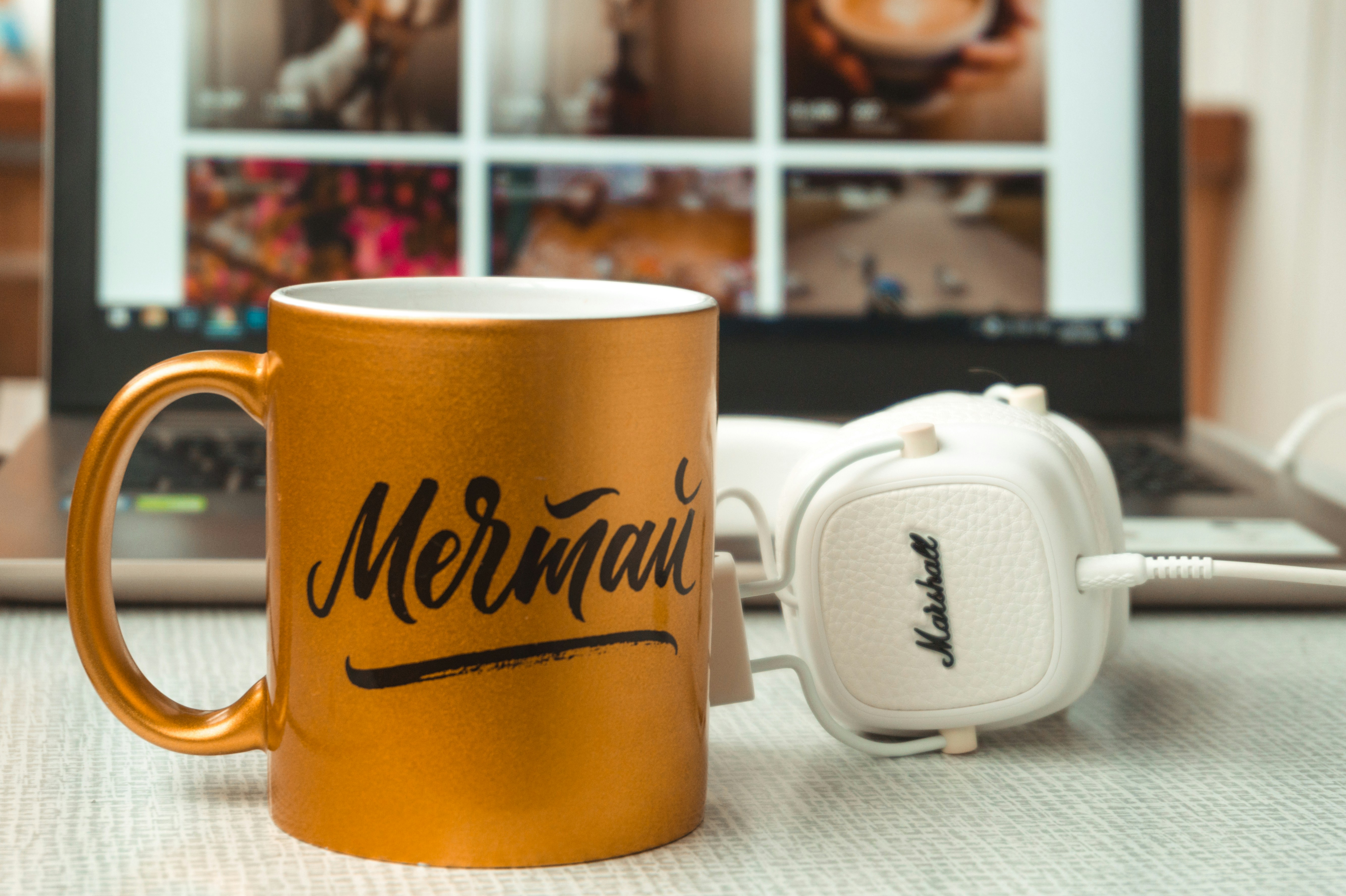 white and yellow ceramic mug