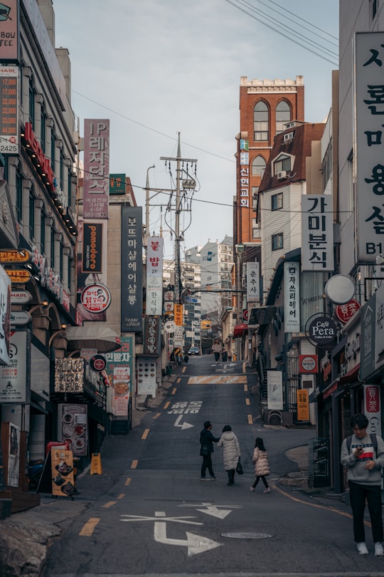 people walking on street during daytime in Seoul South Korea