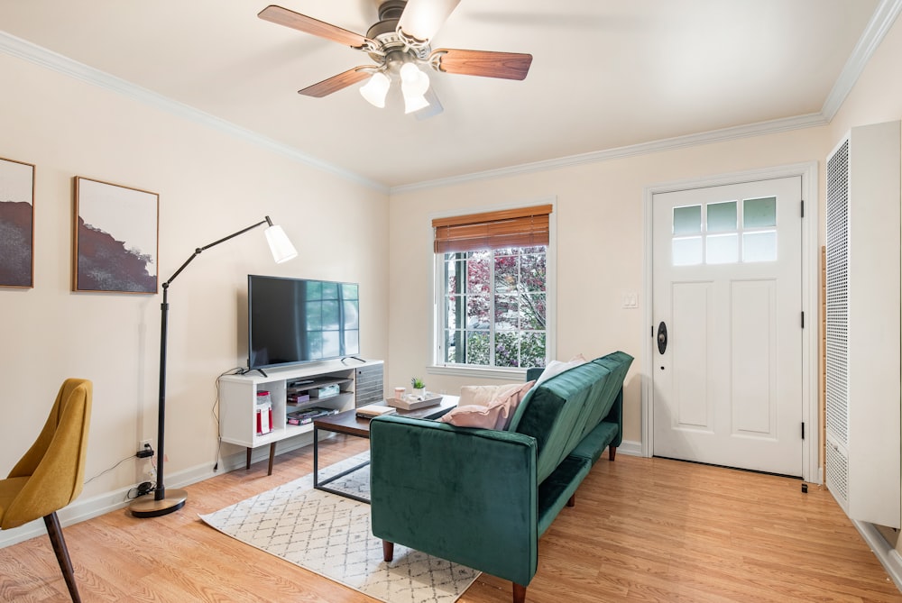 white and brown 4 bladed ceiling fan with light fixture