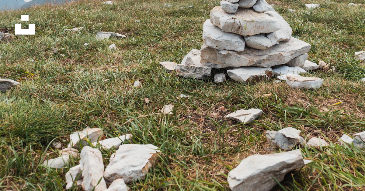 Gray stone on green grass field during daytime photo – Free Monte baldo ...