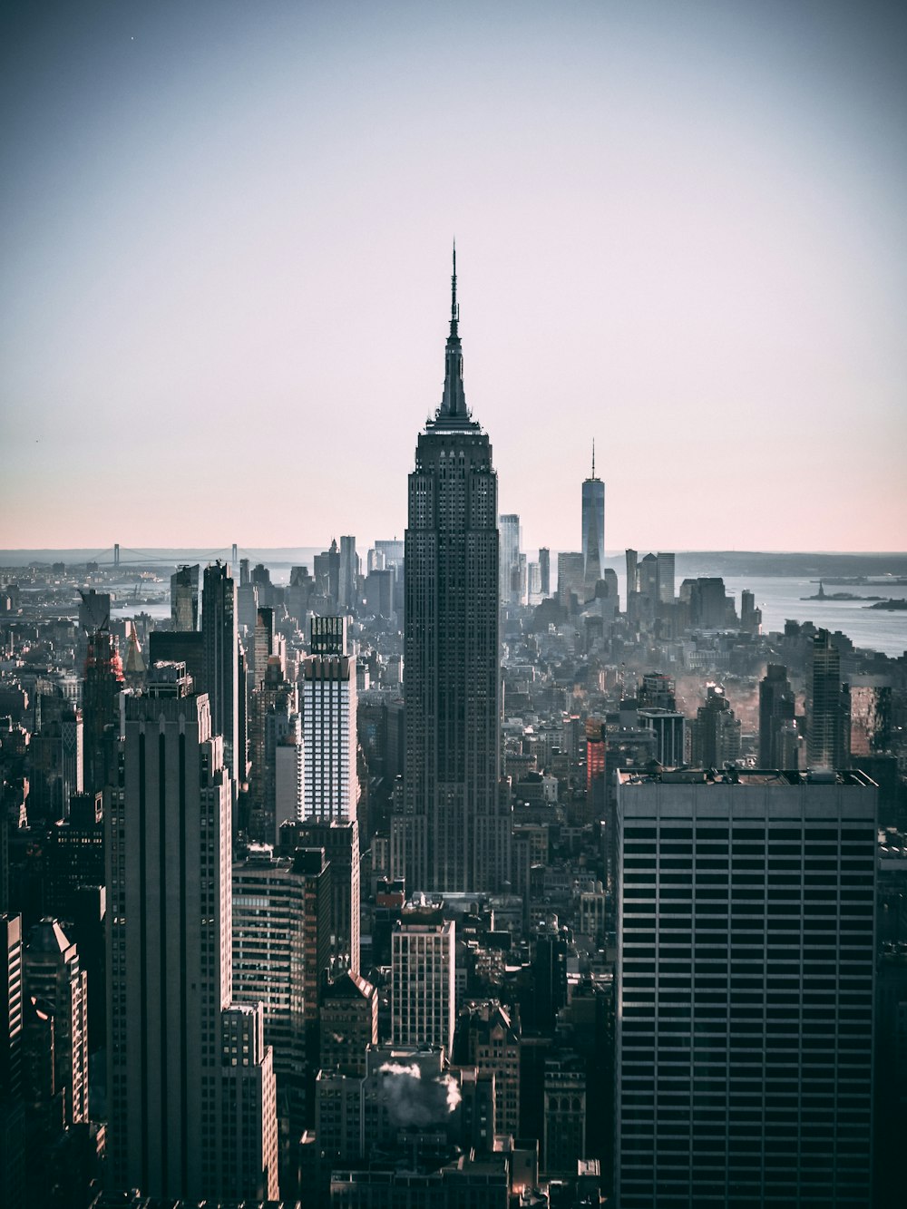 city skyline under gray sky during daytime